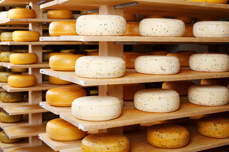 Cheese Wheels On A Shelf