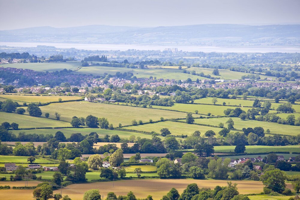 Cotswold Landscape with Farms and Trees
